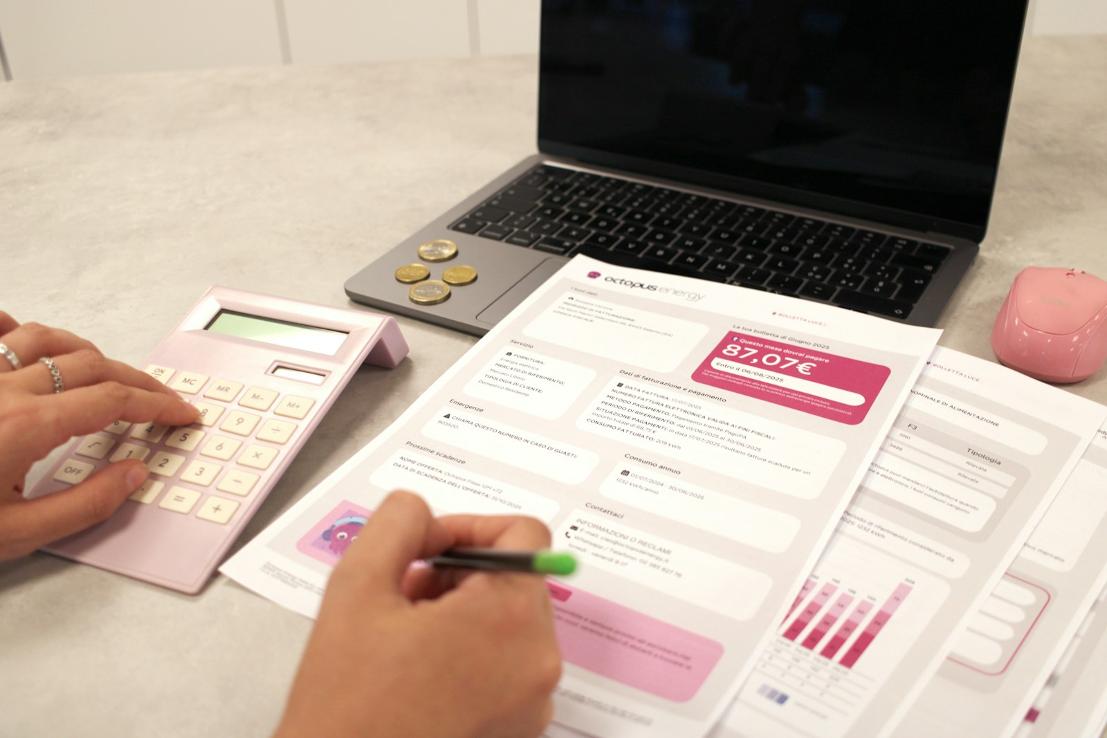A homeowner reviewing bills and calculating monthly home expenses on a desk — the kind of budgeting every Celina homeowner should do at least once a year.